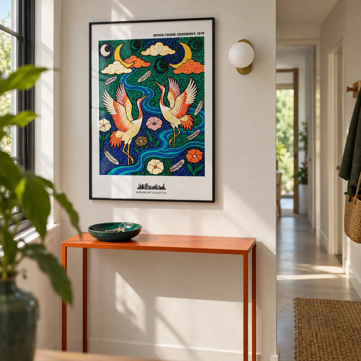 Colorful Crane Poster, framed on the wall of a bright compact hallway in a design-conscious UK home with an off-white wall and pale concrete floor