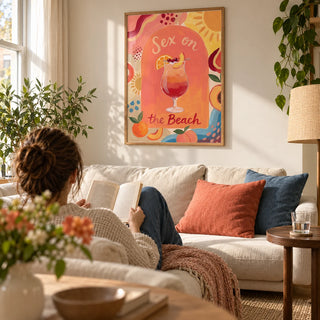 Colorful Drink Poster, framed on the wall of a relaxed modern living room in a UK flat with warm white walls and oak floorboards