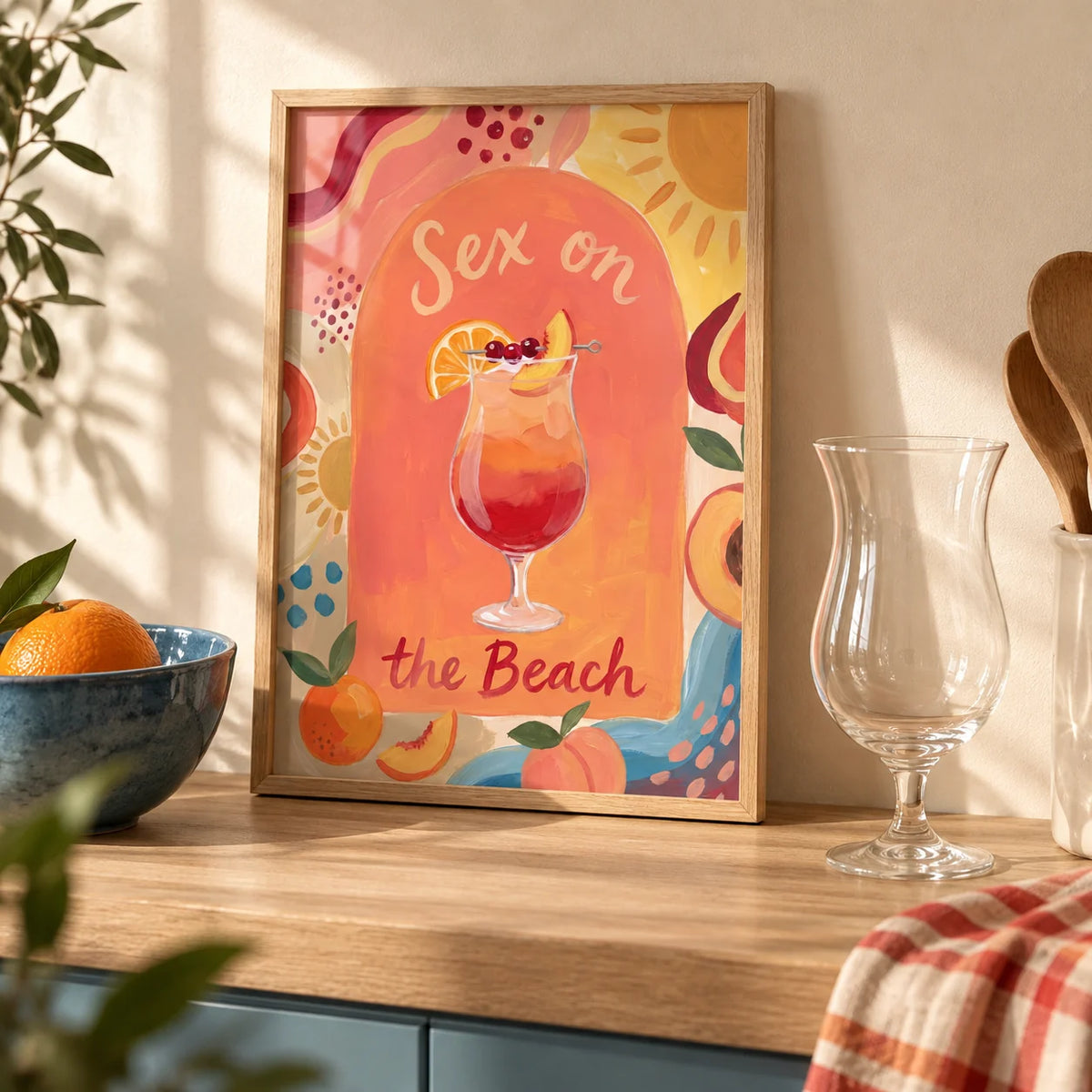Colorful Drink Poster, a small A4 framed print leaning on a pale oak kitchen worktop