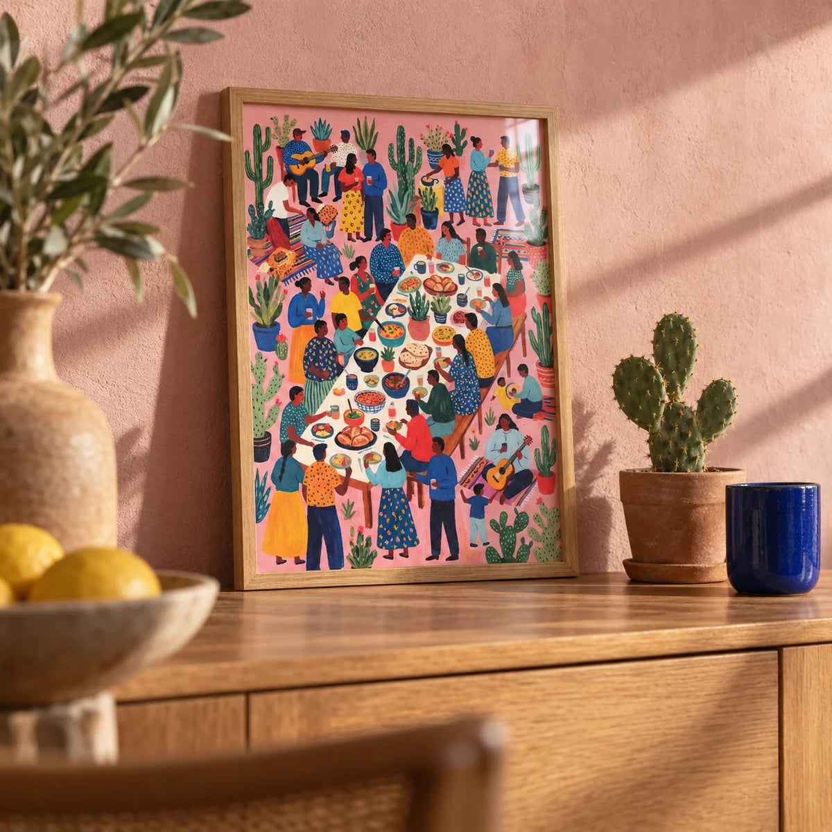 Fiesta Art, a small A4 framed print leaning on an oak sideboard in a living room