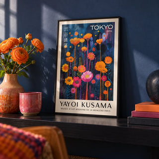 Colorful Flower Wall Art, a small A4 framed print leaning on a black shelf in a living room