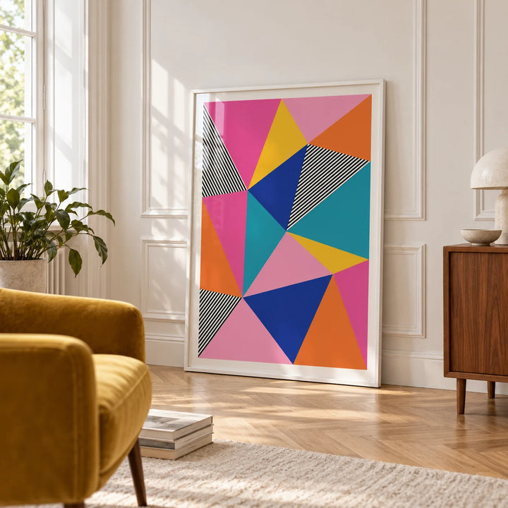 Colorful Geometric Wall Art, framed on the wall of a bright room with white panelled walls and a herringbone floor in a living room