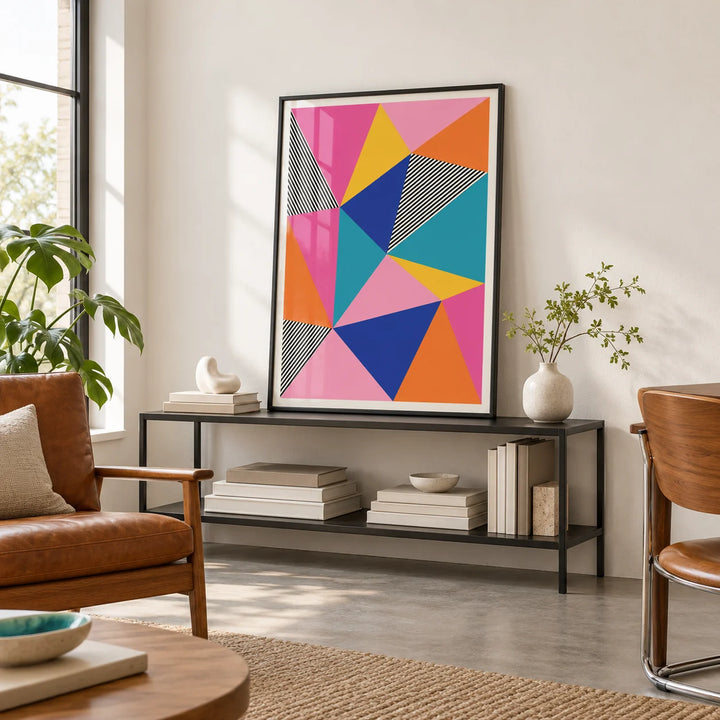 Colorful Geometric Wall Art, framed on the wall of a creative studio with a white wall and grey concrete floor in a home office