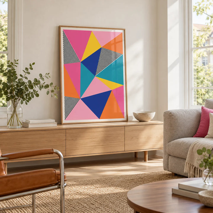 Colorful Geometric Wall Art, framed on the wall of a light living room with big windows