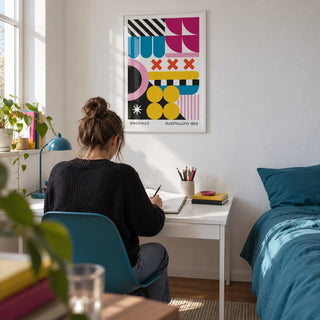 Colorful Prints, framed on the wall of an art student's uni room (18-21) with a white wall in a bedroom