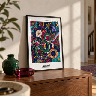 Snake Wall Art, a small A4 framed print leaning on a walnut hallway side table