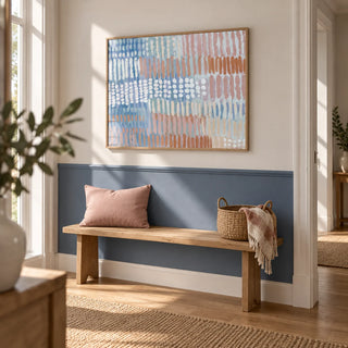 Contemporary Abstract Print, framed on the wall of a bright hallway with a denim blue painted lower wall