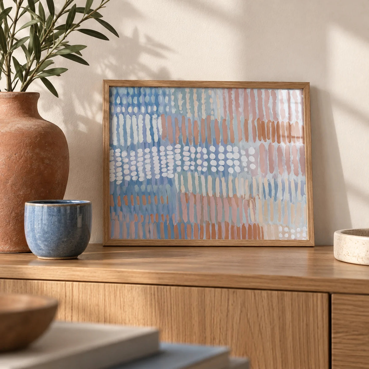 Contemporary Abstract Print, a small A4 framed print leaning on an oak sideboard in a living room