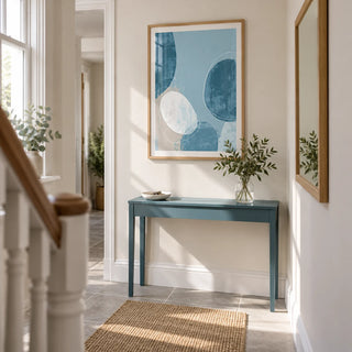 Contemporary Pattern Poster, framed on the wall of a bright narrow hallway in a renovated UK terrace with a warm white wall and pale grey stone flooring