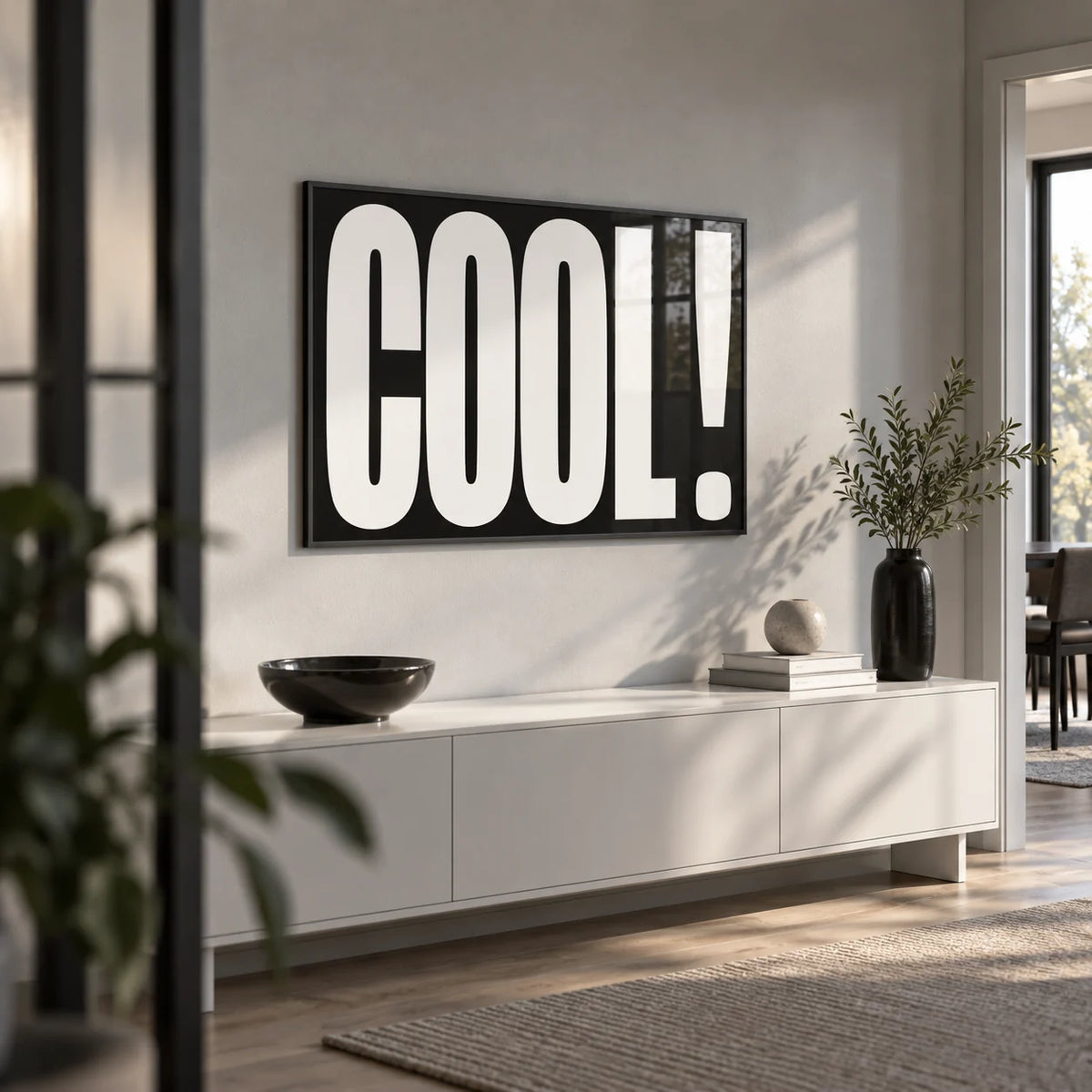 Cool Typography Art, framed on the wall of a modern hallway with a light grey wall