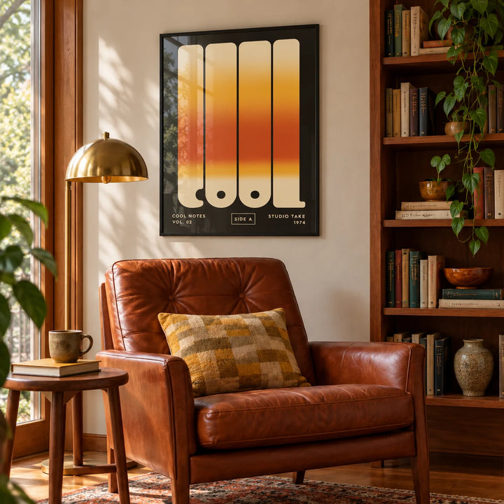 Cool Typography Art, framed on the wall of a reading room with a leather armchair in a living room