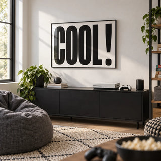 Cool Typography Poster, framed on the wall of a family games room with a white wall in a hallway