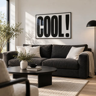 Cool Typography Poster, framed on the wall of a modern living room with a white wall and a pale oak floor