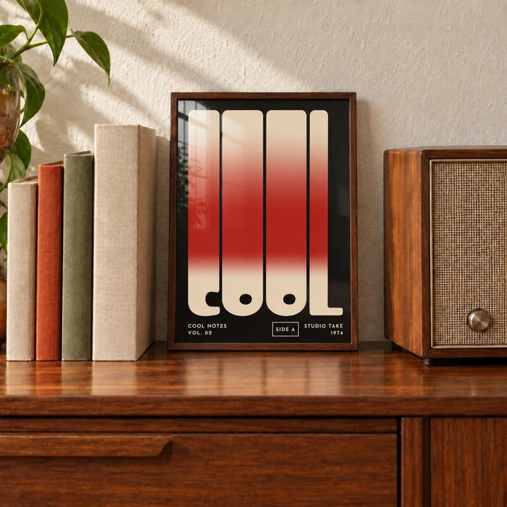 Cool Typography Poster, a small A4 framed print leaning on a walnut sideboard in a living room