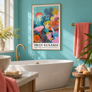 Coral Reef Art, framed on the wall of a fresh bathroom with a turquoise painted wall and a white freestanding bath