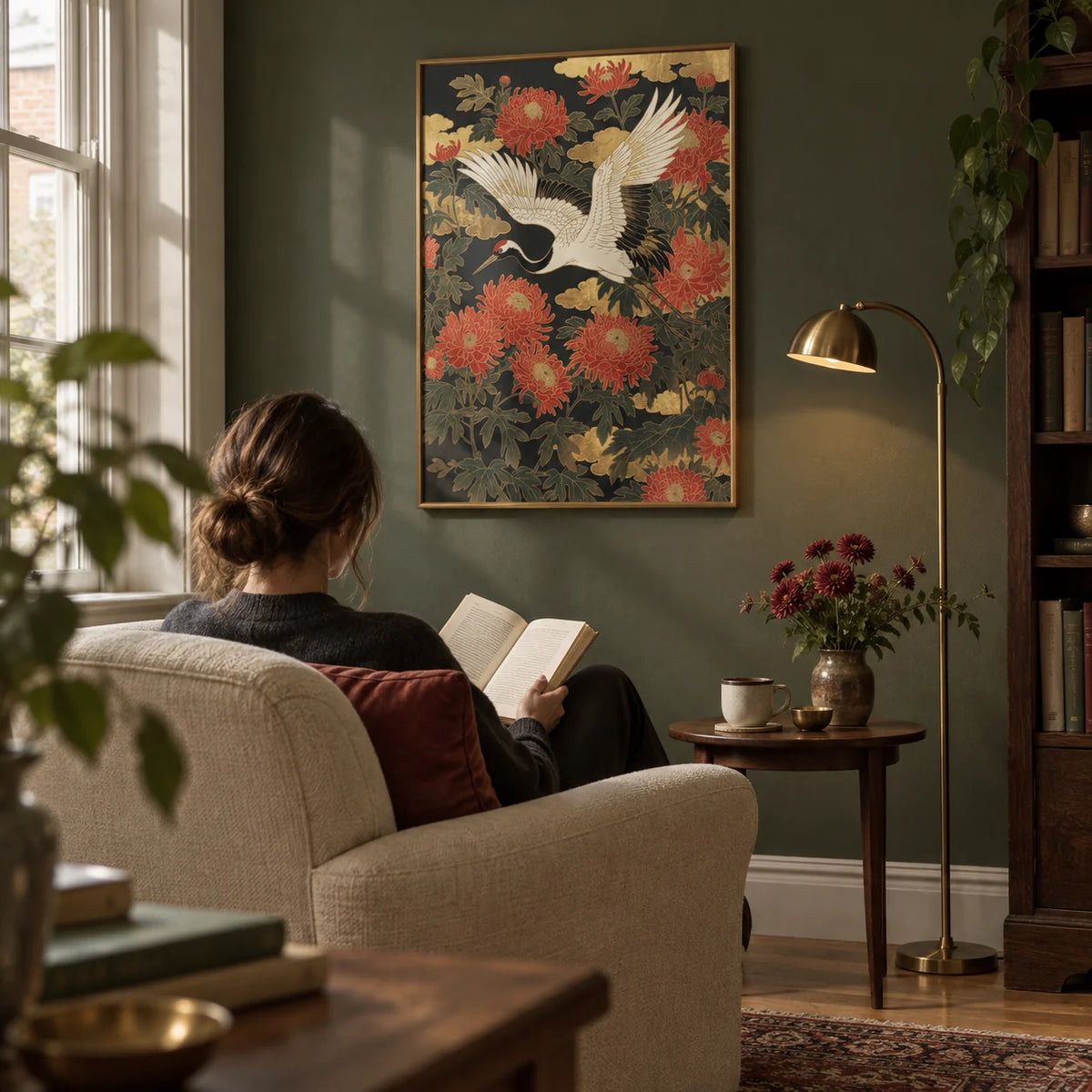 Crane Floral Art Print, framed on the wall of a quiet reading corner in a UK period flat with a muted dark green wall and oak floor in a living room