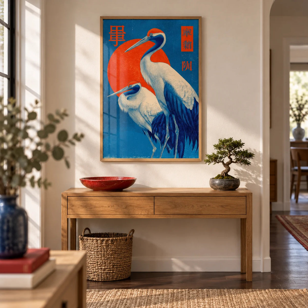 Cranes Art, framed on the wall of a welcoming hallway with a warm white wall and a dark wood floor