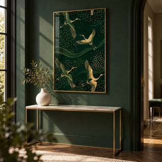 Cranes Gold Art Print, framed on the wall of a elegant hallway with deep green walls