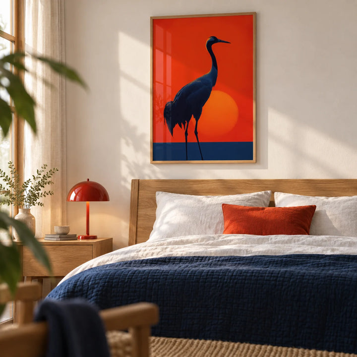Cranes Silhouette Art Print, framed on the wall of a calm bedroom with a soft white wall