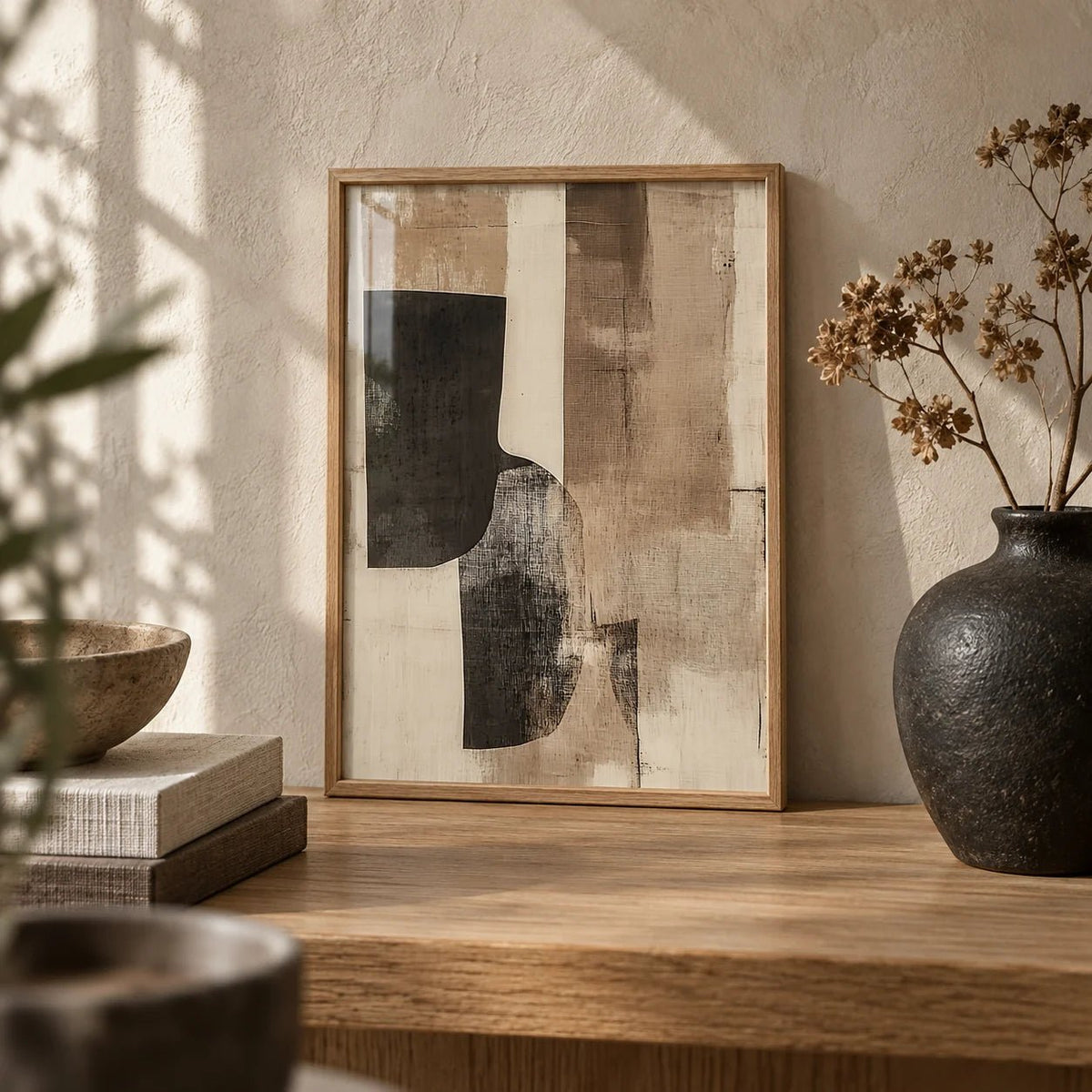 Cream Wall Art, a small A4 framed print leaning on an oak shelf in a living room