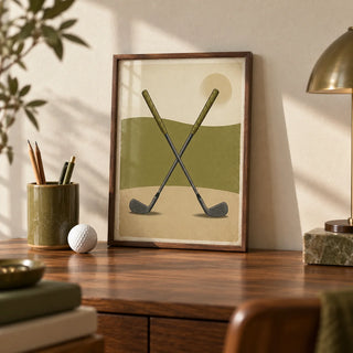 Crossed Golf Clubs Poster, a small A4 framed print leaning on a walnut writing desk
