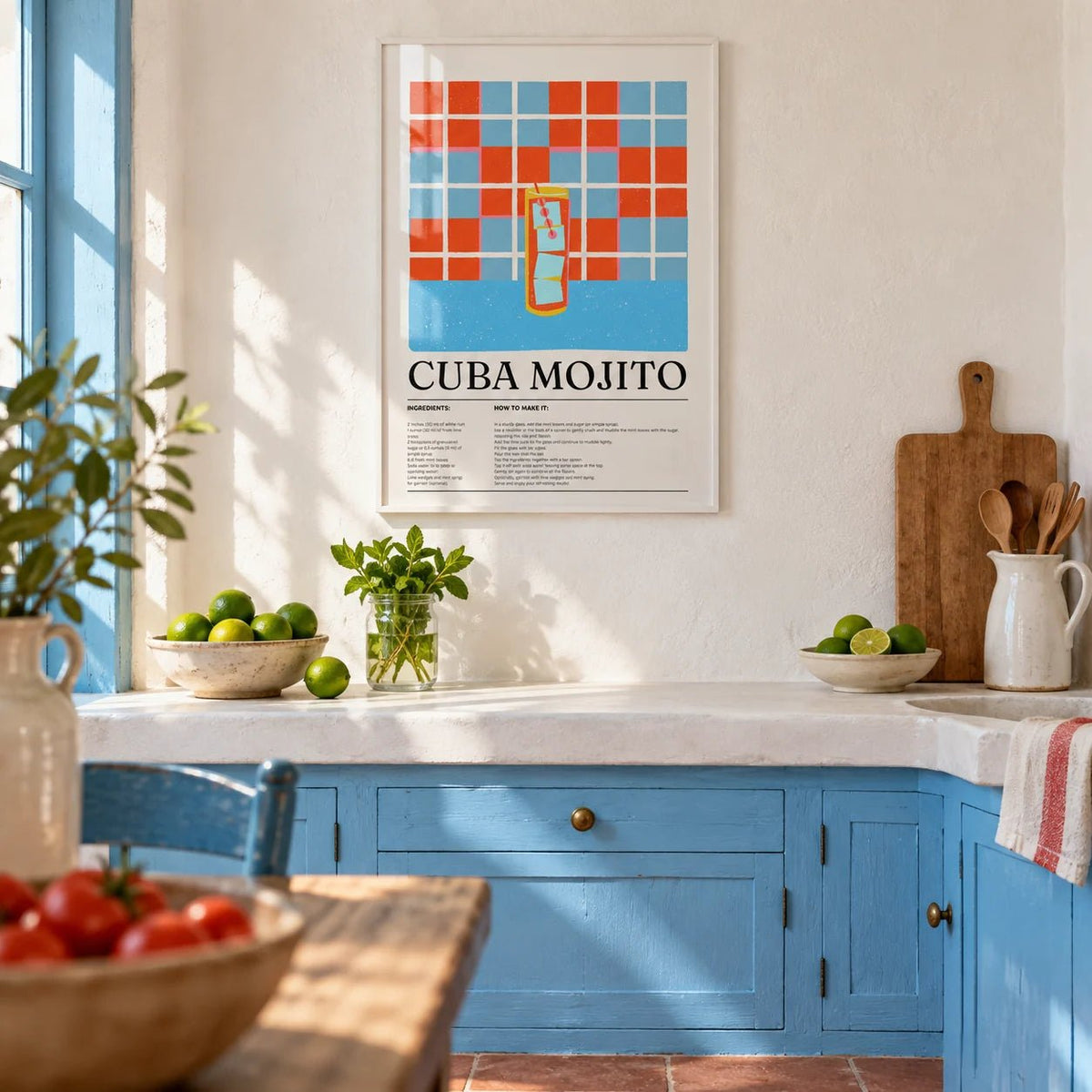Cuban Mojito Recipe, framed on the wall of a sunny Cuban-style kitchen with white limewashed walls and a plain terracotta floor