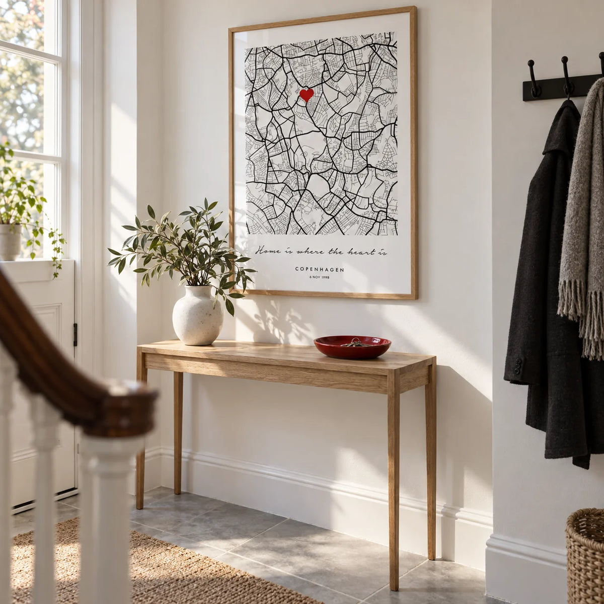 Custom Anniversary Gift, framed on the wall of a bright entrance hallway in a renovated UK terrace with white walls and a pale grey stone floor