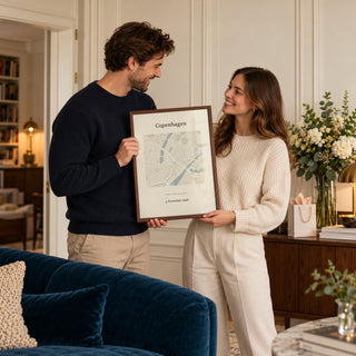 Anniversary Map Print in a anniversary gifting moment, dark wood frame