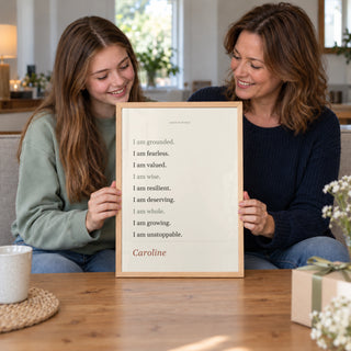 Mother giving a Quote Affirmation Poster to her teenage daughter, natural wood frame