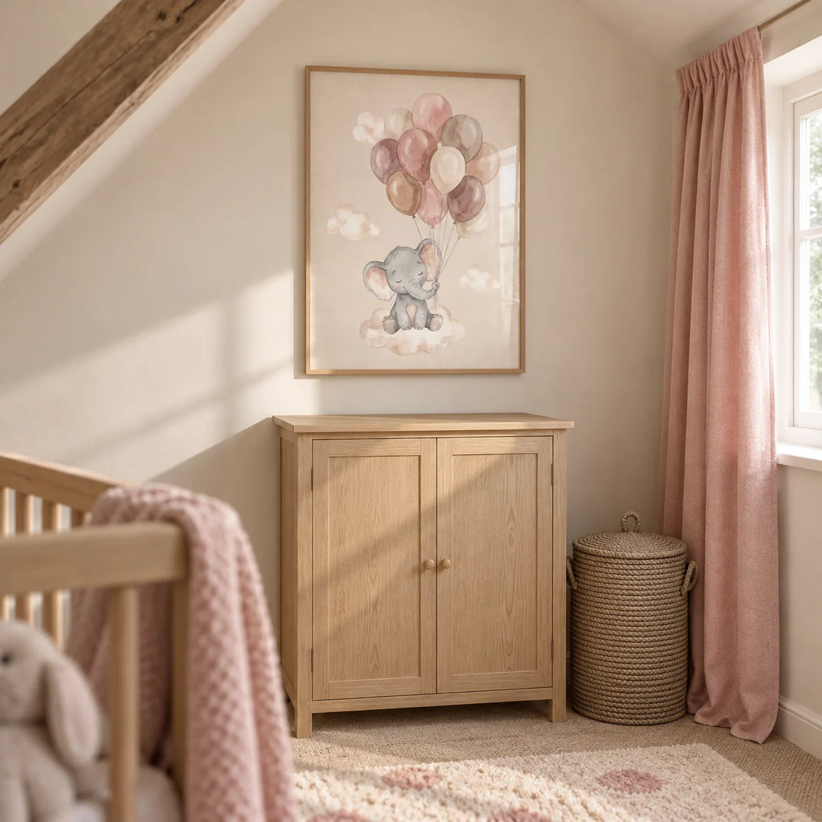 Moon And Sun Print, framed on the wall of a compact attic nursery in a UK cottage with a sloping cream ceiling and a straight warm white end wall