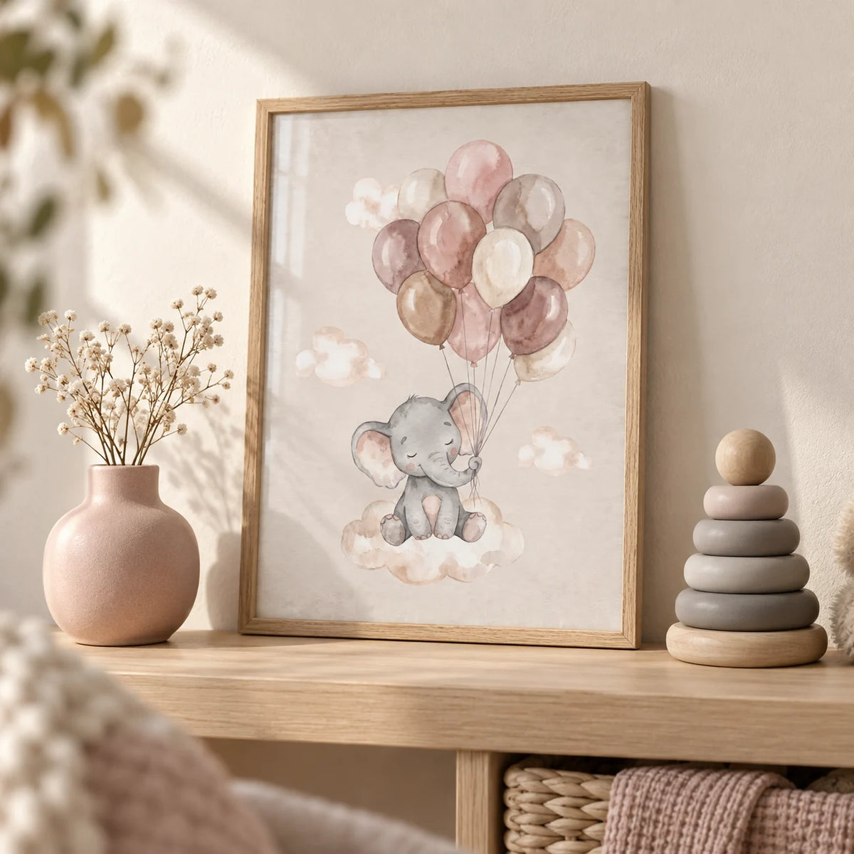 Moon And Sun Print, a small A4 framed print leaning on a pale oak nursery shelf