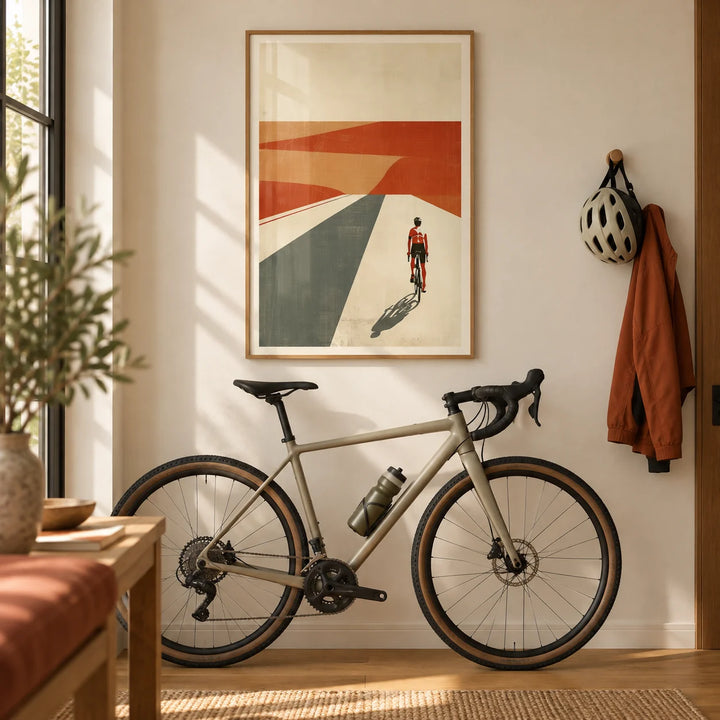 Cycling Landscape Print, framed on the wall of a warm hallway with a cream wall and oak floorboards