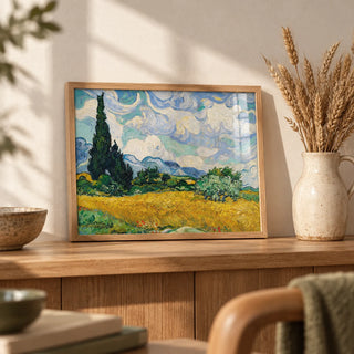 Cypress Tree Landscape, a small A4 framed print leaning on an oak shelf in a living room