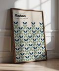 Blue and green wall art print with Bauhaus-style petal shapes on a cream background.