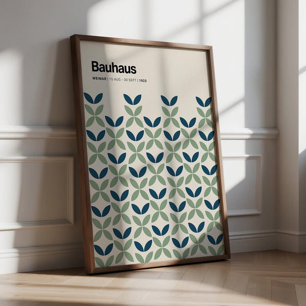 Blue and green wall art print with Bauhaus-style petal shapes on a cream background.