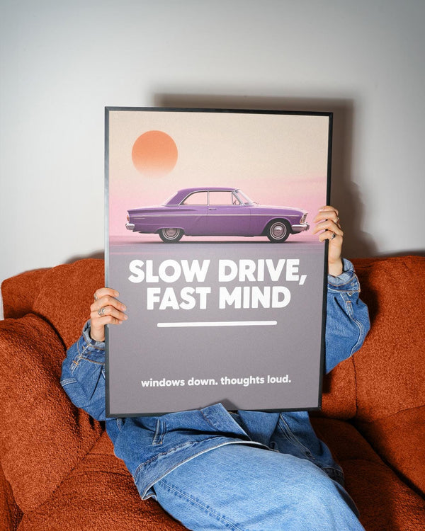 A dreamy pastel horizon behind a classic car in this Vintage Car Wall Art.