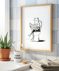 Cartoon Frog Wall Art poster with frog character reading a newspaper on a toilet