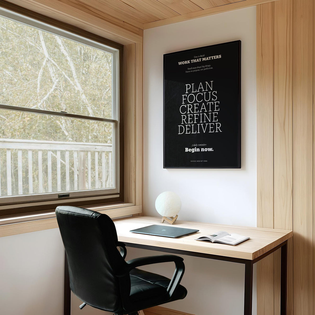 Sleek black inspiring wall decor with a focus on progress and productivity.