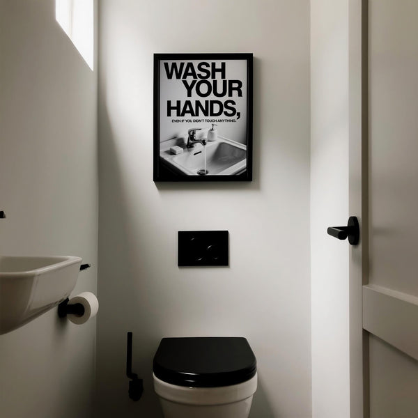Bold typographic Toilet Wall Art with clean, white sink.