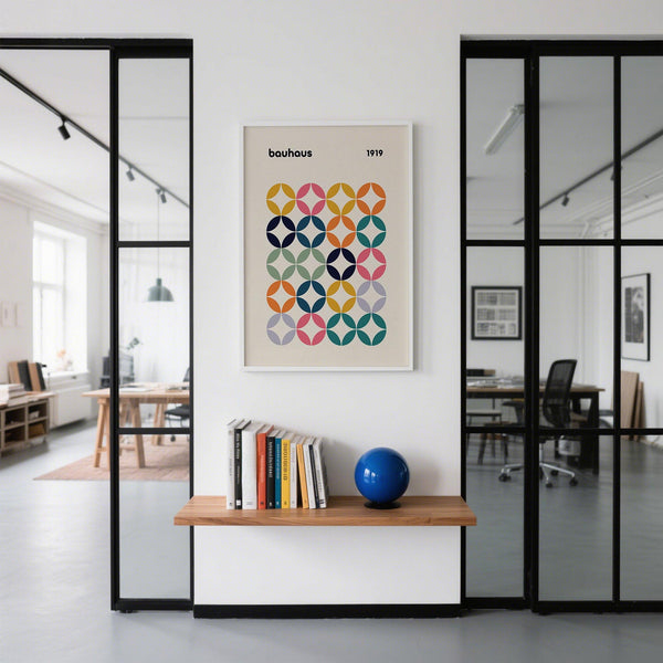 Creative colorful wall art office design in vibrant tones of pink, teal, orange, and mustard.