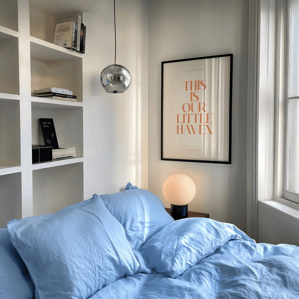 Typography Art Print showing “Leave the day outside” above “This Is Our Little Haven” in tall serif type