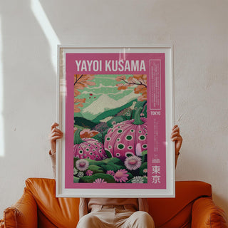 Wall art with pink pumpkins, floral fields, and Mount Fuji in the distance.