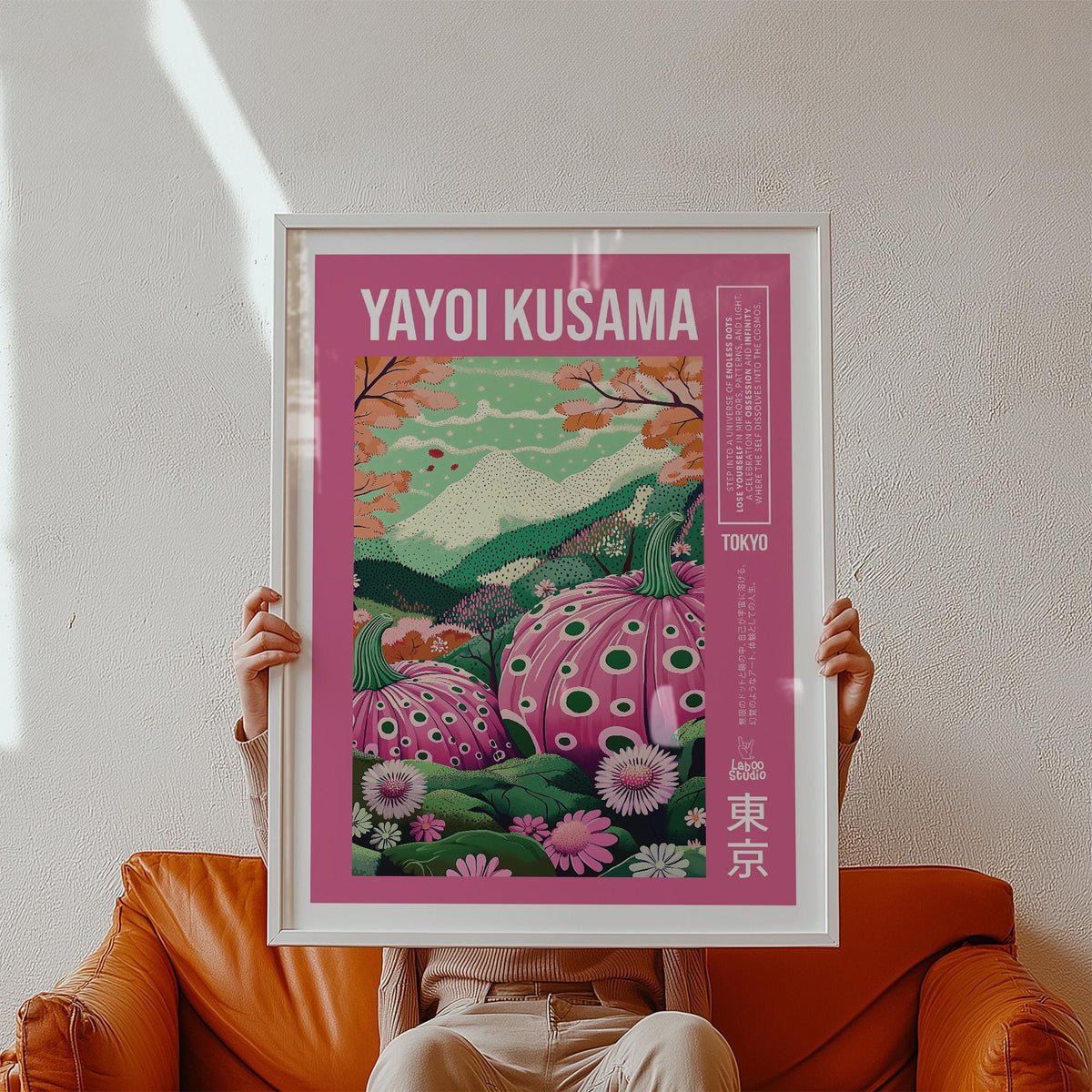 Wall art with pink pumpkins, floral fields, and Mount Fuji in the distance.