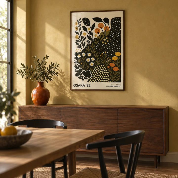 Daisy Art Print, framed on the wall of a modern dining room with a soft mustard limewashed wall