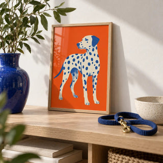 Dalmatian Wall Art, a small A4 framed print leaning on a pale oak shelf in a living room