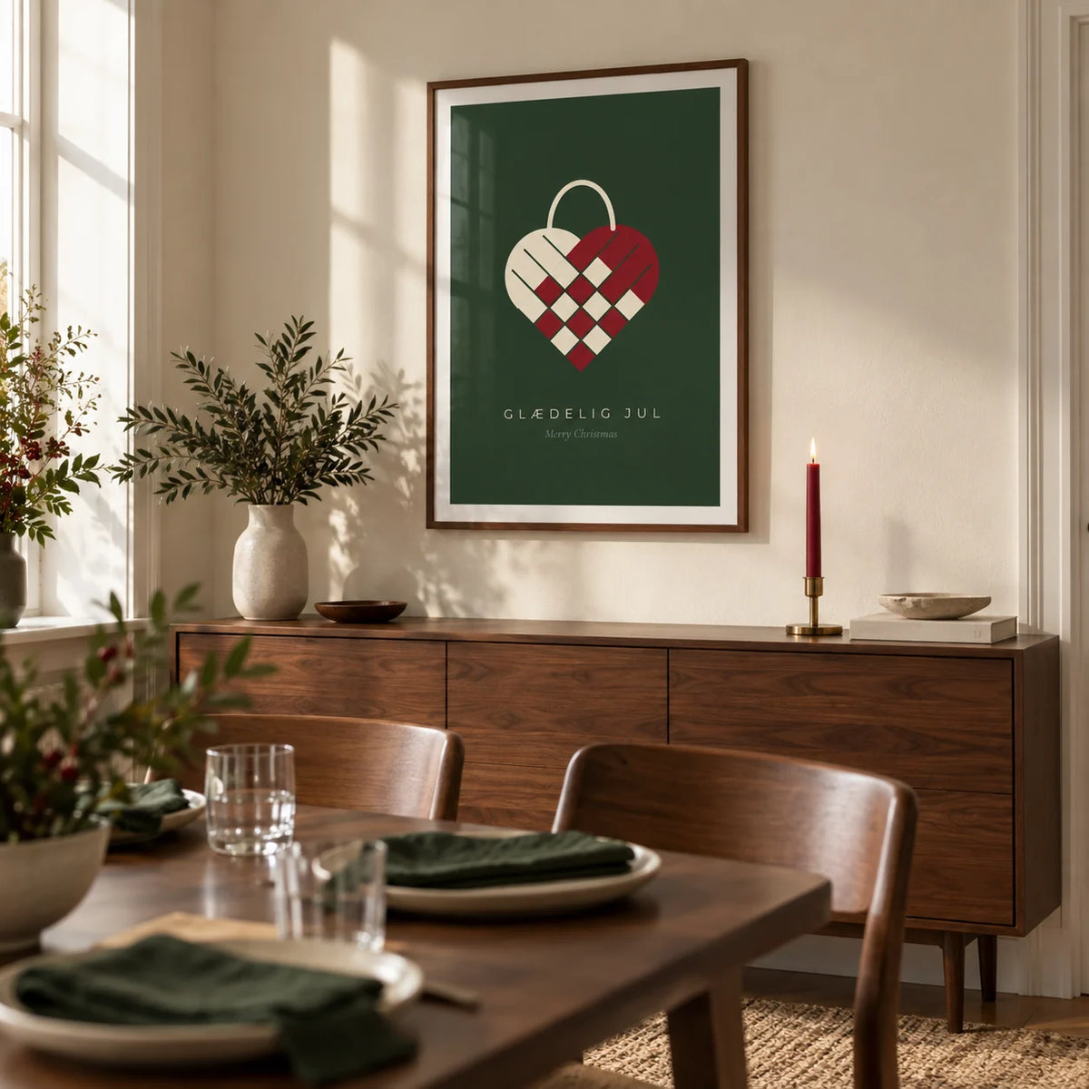 Danish Christmas Print, framed on the wall of a design-led dining room in a UK flat with a soft cream wall and walnut furniture