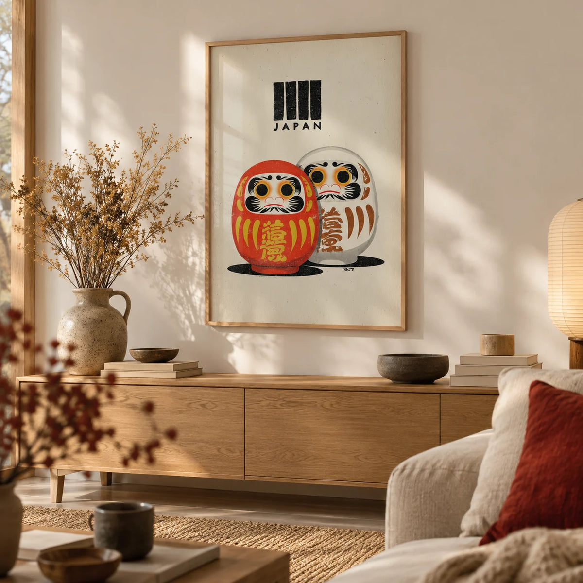 Daruma Print, framed on the wall of a calm Japandi living room with a warm white wall