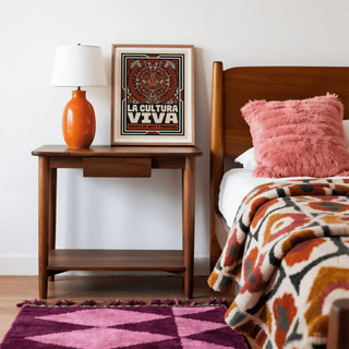 Graphic wall art poster with symmetrical circular emblem and feather details