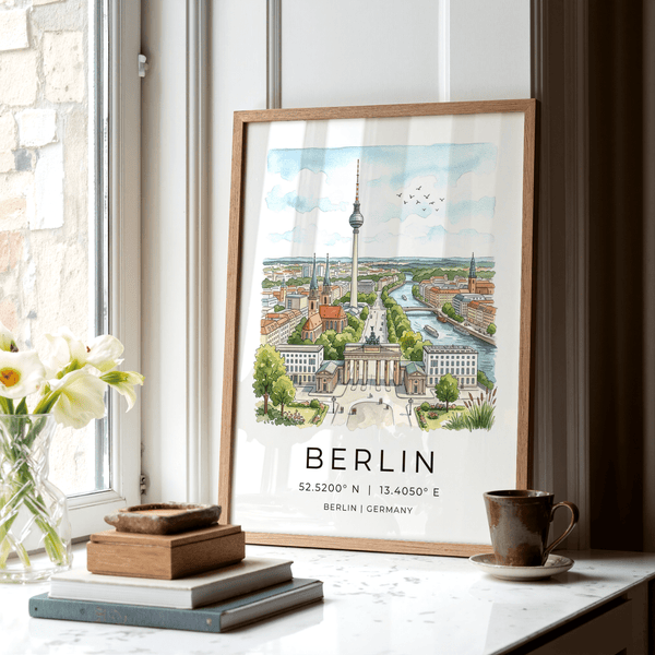 Desk vignette with Berlin City Art Print beside travel journal and pen