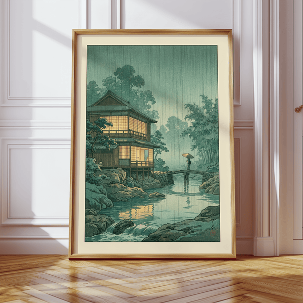 Woodblock-inspired landscape poster showing rain lines, rocky banks, and water reflections